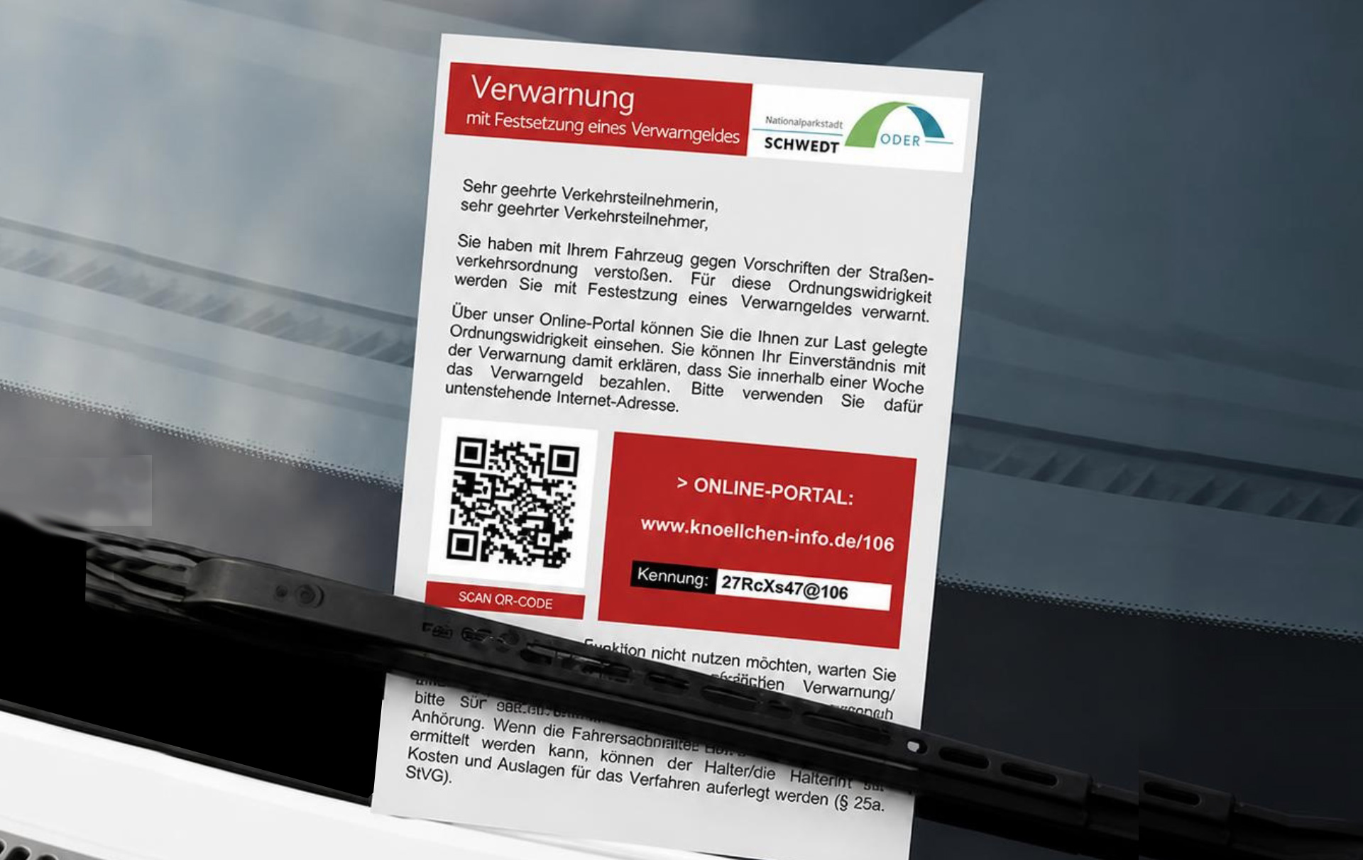 Foto: Karte unterm Scheibenwischer Foto: Karte unterm Scheibenwischer